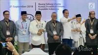 Pasangan capres dan cawapres Jokowi-Ma'ruf Amin dan Prabowo Subianto-Sandiaga Uno di KPU. (Liputan6.com)