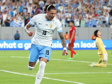 Pemain Uruguay, Darwin Nunez melakukan selebrasi setelah mencetak gol ke gawang Bolivia pada laga Grup C Copa America 2024 di MetLife Stadium, East Rutherford, New Jersey, Jumat (28/06/2024) WIB. (AFP/Charly Triballeau)