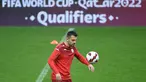 Pemain depan Makedonia Utara Aleksandar Trajkovski menghadiri sesi latihan pada malam pertandingan play-off Piala Dunia 2022 di stadion Dragao di Porto, Senin (28/3/2022). Makedonia Utara akan menantang Portugal pada Rabu, 30 Maret 2022 dini hari WIB. (MIGUEL RIOPA/AFP)