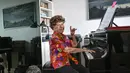 Colette Maze telah bermain piano selama lebih dari satu abad, dan masih memiliki ribuan penggemar di media sosial. (Stéphane DE SAKUTIN / AFP)
