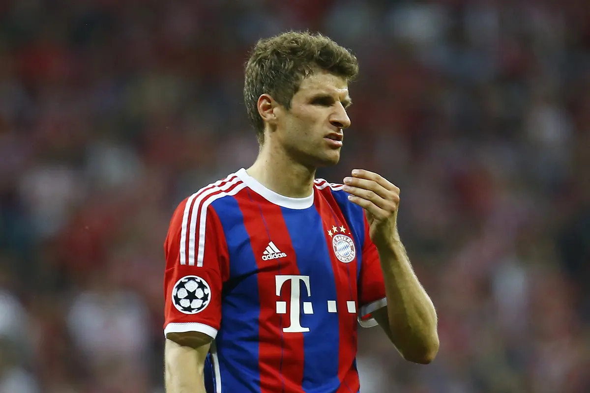 Thomas Mueller cetak gol ke gawang Barcelona (Reuters)