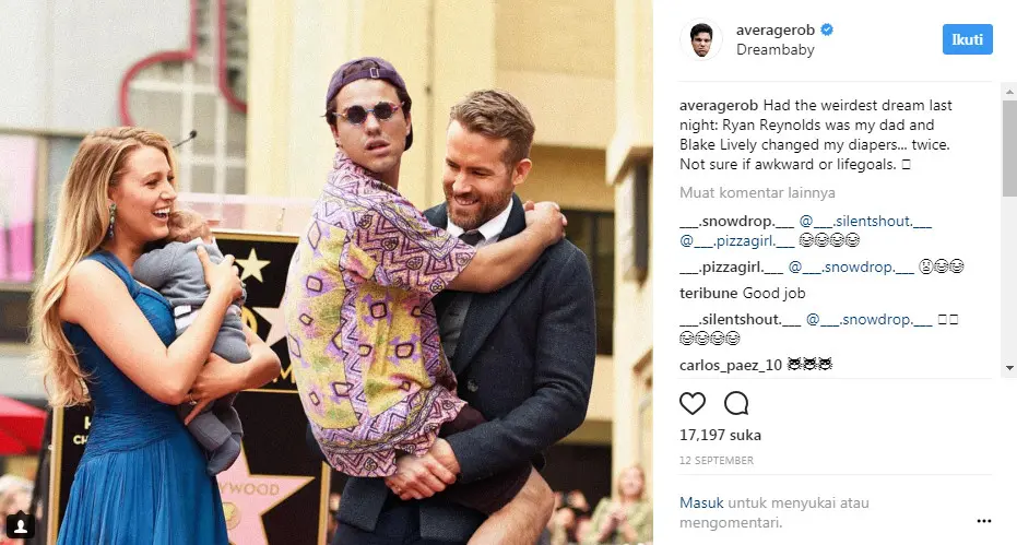 Muka mengesalkan @averagerob dalam gendongan aktor Ryan Reynolds (Sumber: Instagram @averagerob).