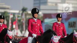 Pasukan berkuda dari polisi satwa mengikuti upacara peringatan HUT Ke-73 Bhayangkara di kawasan Monas, Jakarta, Rabu (10/7/2019).  Hut Ke-73 Bhayangkara ini bertemakan ‘Dengan semangat Promoter, Pengabdian Polri untuk Masyarakat, Bangsa dan Negara. (Liputan6.com/Faizal Fanani)