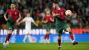 Portugal unggul selisih gol dari Bosnia Herzegovina yang juga menang 3-0 atas Islandia pada laga lainnya. (AP Photo/Armando Franca)