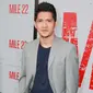 Aktor Indonesia, Iko Uwais memeriahkan acara gala premier film Mile 22 di Los Angeles, Kamis (9/8). Iko Uwais berperan sebagai polisi Indonesia yang bekerja sama dengan agen CIA dalam film besutan Peter Berg tersebut. (Rich Fury/Getty Images/AFP)