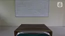 Suasana SMPN 2 Depok, Pancoran Mas, Depok, Jawa Barat, Jumat (19/11/2021). Pemkot Depok menghentikan sementara pelaksanaan PTMT seluruh sekolah di kawasan Pancoran Mas hingga 29 November 2021 akibat terjadinya penambahan kasus COVID-19 yang berasal dari klaster PTMT. (Liputan6.com/Herman Zakharia)
