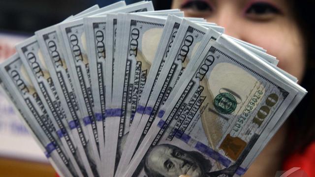<span>Nilai tukar rupiah terhadap dolar Amerika Serikat (AS) terus menguat, Jakarta, Kamis (23/10/2014) (Liputan6.com/Johan Tallo)</span>