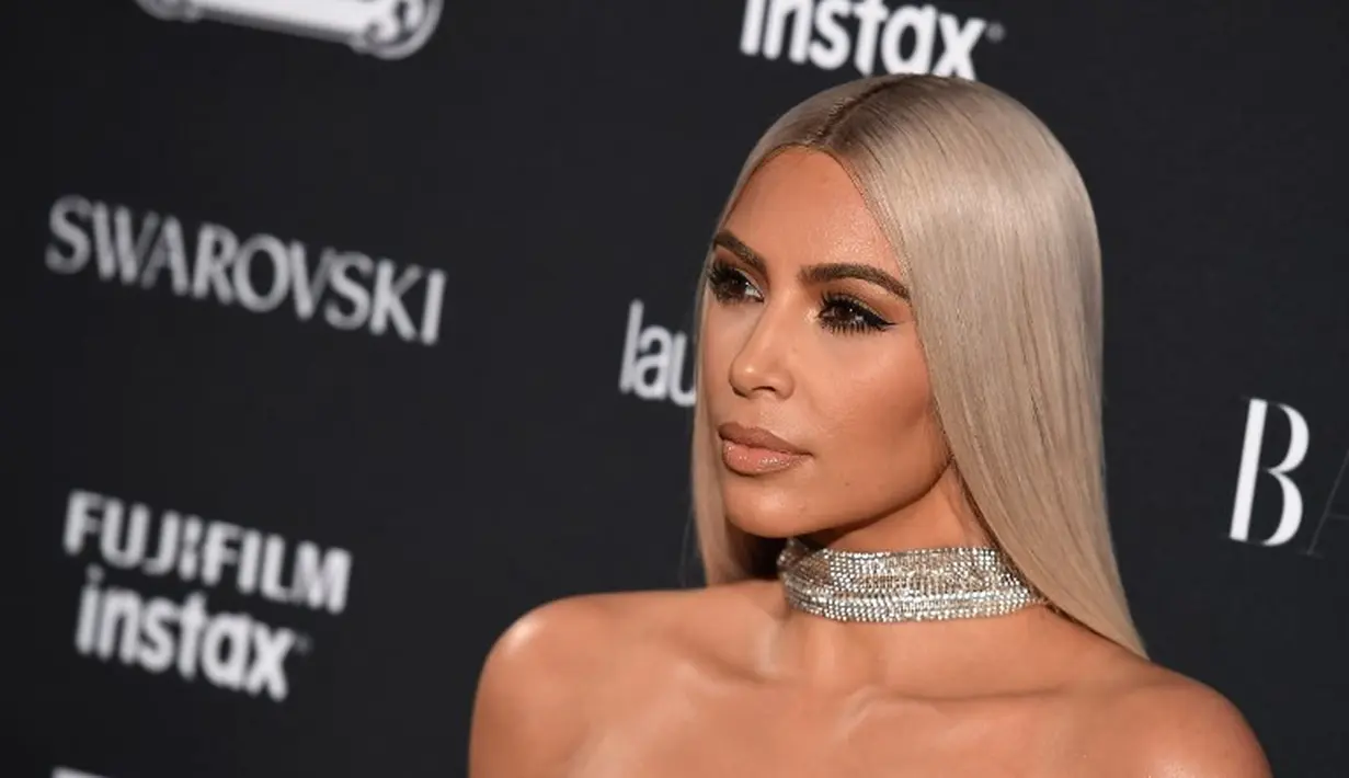 "Kim sangat terganggu atas rumor ia dan Drake karena itu adalah hal yang melecehkan suami dan juga perikahannya," ujar sumber. (Angela Weiss - AFP)