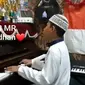 Tegar Maulana Razzak, penyandang tunanetra berprestasi yang ciptakan lagu tentang Ramadhan. Foto: Dokumen pribadi Tegar Maulana Razzak.