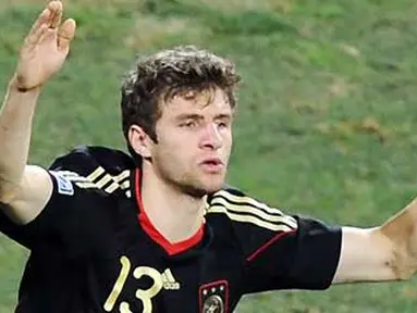Selebrasi gol striker Jerman Thomas Mueller di laga perebutan tempat ketiga PD 2010 melawan Uruguay di Nelson Mandela Bay Stadium, Port Elizabeth, 10 Juli 2010. Jerman unggul 3-2. AFP PHOTO / CARL DE SOUZA 