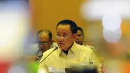 Menteri Hukum dan Hak Asasi Manusia, Amir Syamsuddin, saat mengikuti rapat kerja dengan Komisi III DPR RI di Gedung Parlemen, (28/8/2014). (Liputan6.com/Andrian M Tunay)