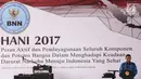 Kepala Badan Narkotika Nasional (BNN), Komjen Pol Budi Waseso memberikan sambutan dalam puncak peringatan Hari Anti-Narkoba Internasional (HANI) di Plaza Tugu Api Pancasila, Taman Mini Indonesia Indah, Jakarta, Kamis (13/7). (Liputan6.com/Faizal Fanani)
