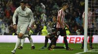 Striker Real Madrid, Alvaro Morata, usai mencetak gol ke gawang Athletic Bilbao, pada pertandingan lanjutan La Liga, di Santiago Bernabeu, Minggu (23/10/2016). (AFP/Curto De La Torre). 