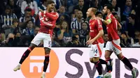 FC Porto tertinggal lebih dulu pada menit ke-7 setelah aksi apik pemain Manchester United Marcus Rashford. (MIGUEL RIOPA/AFP)