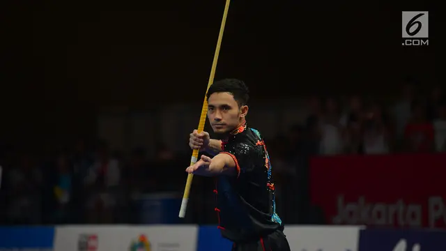 Aksi Atlet Wushu Achmad Hulaefi Saat Raih Medali Perunggu