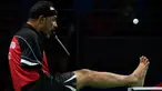 Atlet Mesir, Ibrahim Hamadtou bersiap memukul bola dengan bantuan kakinya saat bertanding melawan atlet Jerman, Thoma Rau pada cabang tenis meja tunggal putra di ajang Paralimpiade 2016, Rio de Janeiro, 9 September 2016. (Thomas Lovelock/OIS/IOC via AFP)