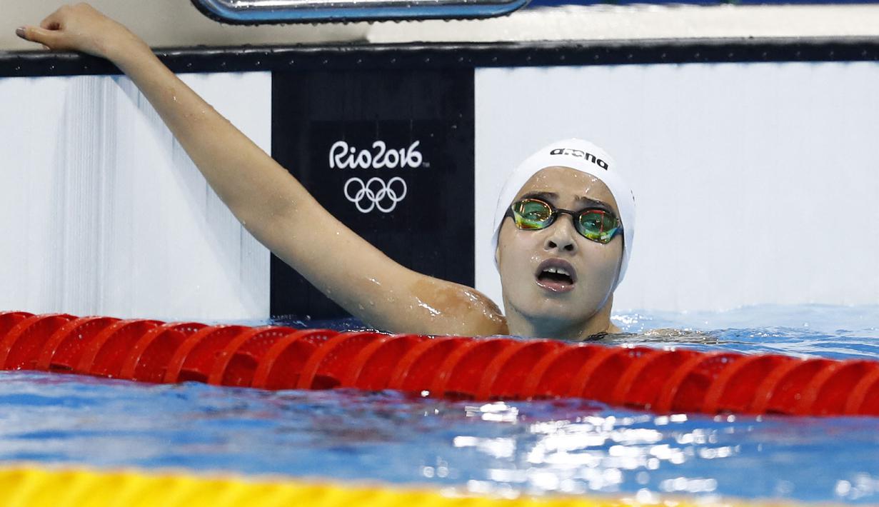 Setibanya di Jerman, Yusra kembali membangun impiannya yang sempat kandas. Berkat kerja kerasnya, Ia terpilih menjadi salah satu perenang yang mewakili Tim Pengungsi pada Olimpiade Rio 2016. Dirinya menempati posisi 41 dengan raihan waktu 1:09.21 pada debutnya di Olimpiade. (Foto: AFP/Martin Bureau)