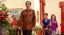 Presiden Jokowi saat menghadiri halal bihalal di Istana Negara, Jakarta, Rabu (22/7). Acara tersebut dihadiri sejumlah menteri kabinet kerja dan pimpinan lembaga negara. (Liputan6.com/Faizal Fanani)
