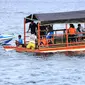 Upaya penyelamatan korban tabrakan kapal cepat dan banana boat di Pantai Tanjung Karang, Donggala. (Liputan6.com/M Taufan SP Bustan)