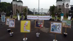 Sejumlah aktivis melakukan aksi damai di depan Kompleks Parlemen Senayan, Jakarta, Selasa (14/7/2020). Dalam aksinya mereka menuntut DPR untuk membatalkan Rancangan Undang-Undang (RUU) Cipta kerja atau Omnibus Law. (merdeka.com/Imam Buhori)