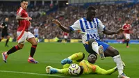 Brighton &amp; Hove Albion melawan Manchester United. (Bola.com/Dok.AFP/Glyn KIRK).