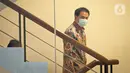 Wakil Ketua DPR RI Azis Syamsuddin menaiki tangga Gedung KPK, Jakarta, Jumat (24/9/2021). Kehadiran Azis untuk menjalani pemeriksaan pertama terkait kasus dugaan suap penanganan perkara di Kabupaten Lampung Tengah. (Liputan6.com/Faizal Fanani)