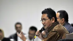 Udar Pristono memberikan keterangan terkait kapasitasnya sebagai Kadishub DKI Jakarta dalam kasus dugaan korupsi pengadaan TransJakarta dengan terdakwa Drajad Adhyaksa dan Seyito Luhu di pengadilan Tipikor Jakarta, Senin (3/11/2014). (Liputan6.com/Miftahu