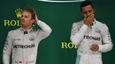 F1 2016 menjadi arena pertarungan sengit duo Mercedes, Nico Rosberg dan Lewis Hamilton. Seri terakhir, GP Abu Dhabi, yang akan dihelat 27 November 2016 akan menjadi ajang penentuan gelar juara dunia. (AFP/Nelson Almeida)