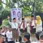 Pasangan bakal calon Gubernur Riau dan Wakil Gubernur Riau usai mendaftar ke KPU untuk mengikuti Pilkada serentak. (Liputan6.com/M Syukur)