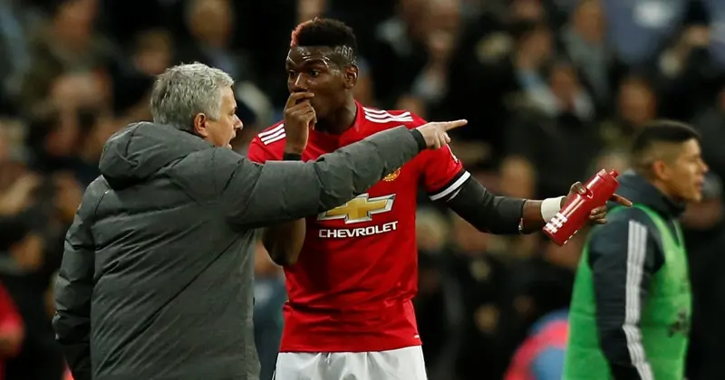 Jose Mourinho dan Paul Pogba (AFP/Ian Kington)