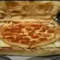 Selain menciptakan kotak pizza yang bisa dimakan, kedai ini juga pernah membuat pizza dengan topping pizza.