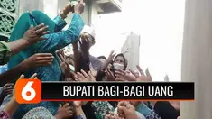 Bupati Bekasi membagi-bagikan uang kepada warga, saat kunjungan kerja hingga terjadi kerumunan yang berisiko terjadinya penularan Covid-19 ! Haduh...