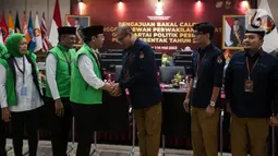Kedatangan PPP untuk mendaftarkan Bacaleg ke KPU molor dari jadwal yang ditetapkan KPU. (Liputan6.com/Johan Tallo)