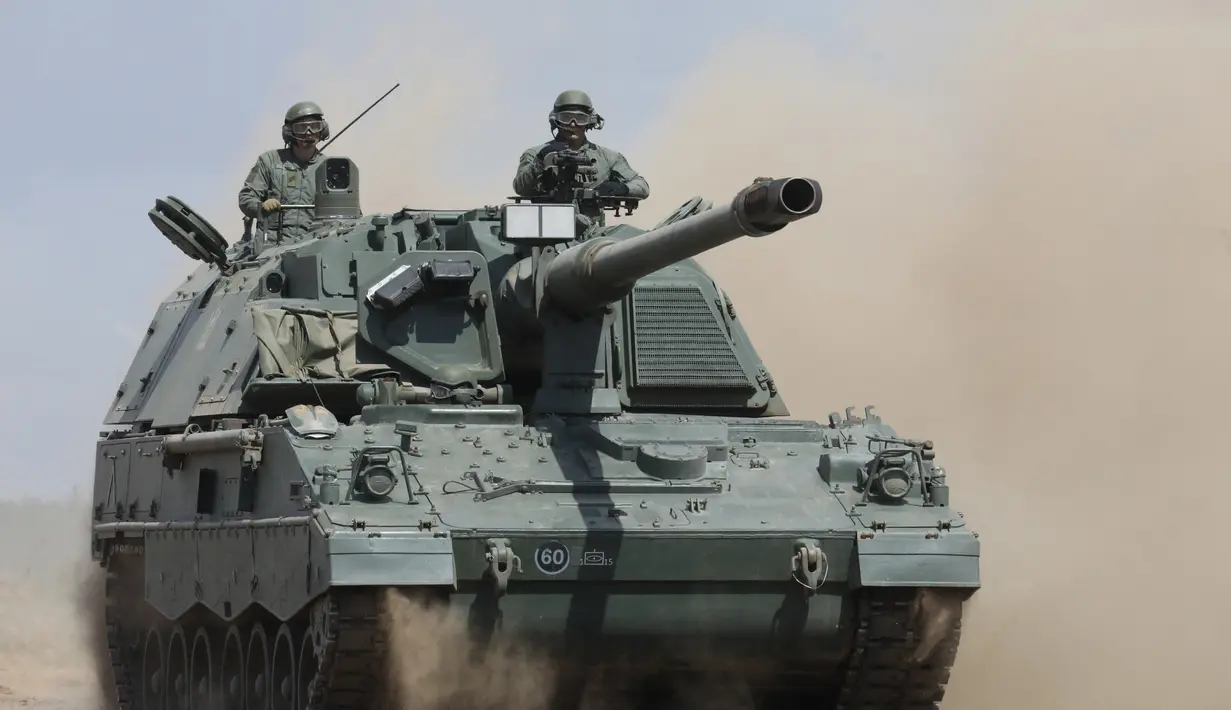 Pengerahan pasukan dalam jumlah besar juga harus sesuai dengan rencana regional NATO yang akan merinci cara menanggapi serangan Rusia suatu hari nanti. (AFP/PETRAS MALUKAS)