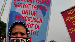 Massa melakukan unjuk rasa menolak Ahok sebagai gubernur di depan Istana Negara, Jakarta, Rabu (19/11/2014) (Liputan6.com/Johan Tallo)