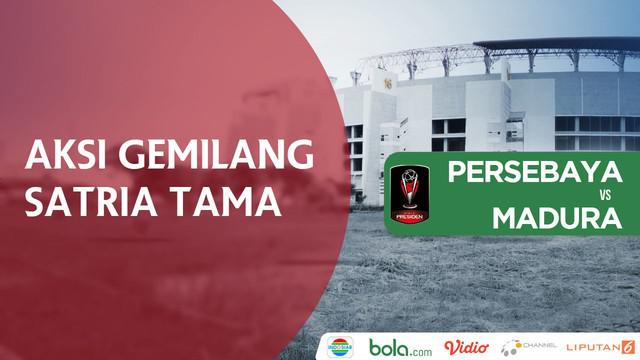 Kiper Madura United, Satria Tama, tampil gemilang saat menghadapi Persebaya Surabaya.