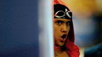 Perenang Singapura, Joseph Schooling, saat beraksi di nomor 100 meter gaya kupu-kupu putra pada Asian Games di Akuatik, GBK, Jakarta, Rabu (22/8/2018). Joseph Schooling sukses persembahkan medali emas pertama untuk Singapura. (Bola.com/Peksi Cahyo)