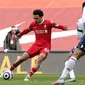 The Reds akhirnya berbalik unggul pada menit ke-90+1 lewat gol Trent Alexander-Arnold, yang memanfaatkan bola rebound hasil tendangan Thiago Alcantara. (Foto: AFP/Pool/Clive Brunskill)