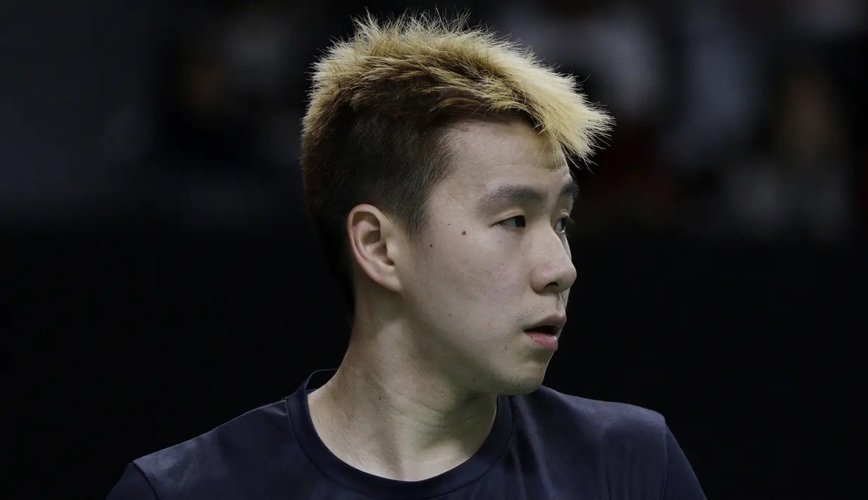 Ganda putra Indonesia, Marcus Gideon, tampak fokus saat melawan ganda Jerman pada Indonesia Masters 2019 di Istora Senayan, Jakarta, Rabu (23/1). Kevin / Marcus lolos ke 16 besar. (Bola.com/M. Iqbal Ichsan)
