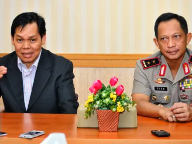 Kapolda Metro Jaya Irjen Tito Karnavian dan Wakil Sekjen MUI Amirsyah Tambunan melakukan pertemuan di Polda Metro Jaya, Jakarta, Selasa (7/7/2015). Pertemuan itu membahas Sahur On The Road (SOTR) yang akhir-akhir ini meresahkan (Liputan6.com/Yoppy Renato)