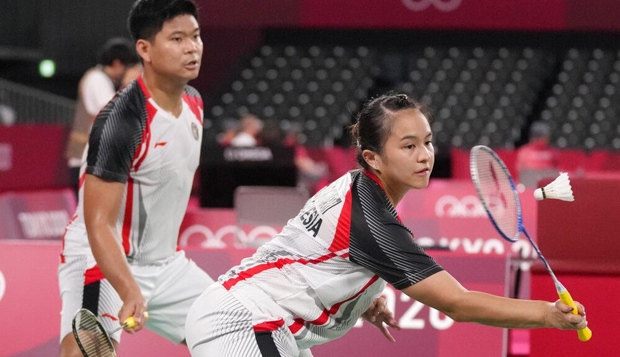 Hasil ini membuat perjuangan Praveen Jordan/Melati Daeva Oktavianti di Olimpiade Tokyo 2020 cabang olahraga bulutangkis nomor ganda campuran harus terhenti di babak perempat final. (Foto: AP/Dita Alangkara)