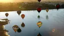 Festival Balon Udara Internasional ke-21 diselenggarakan sejak 17 November 2023. (ULISES RUIZ/AFP)