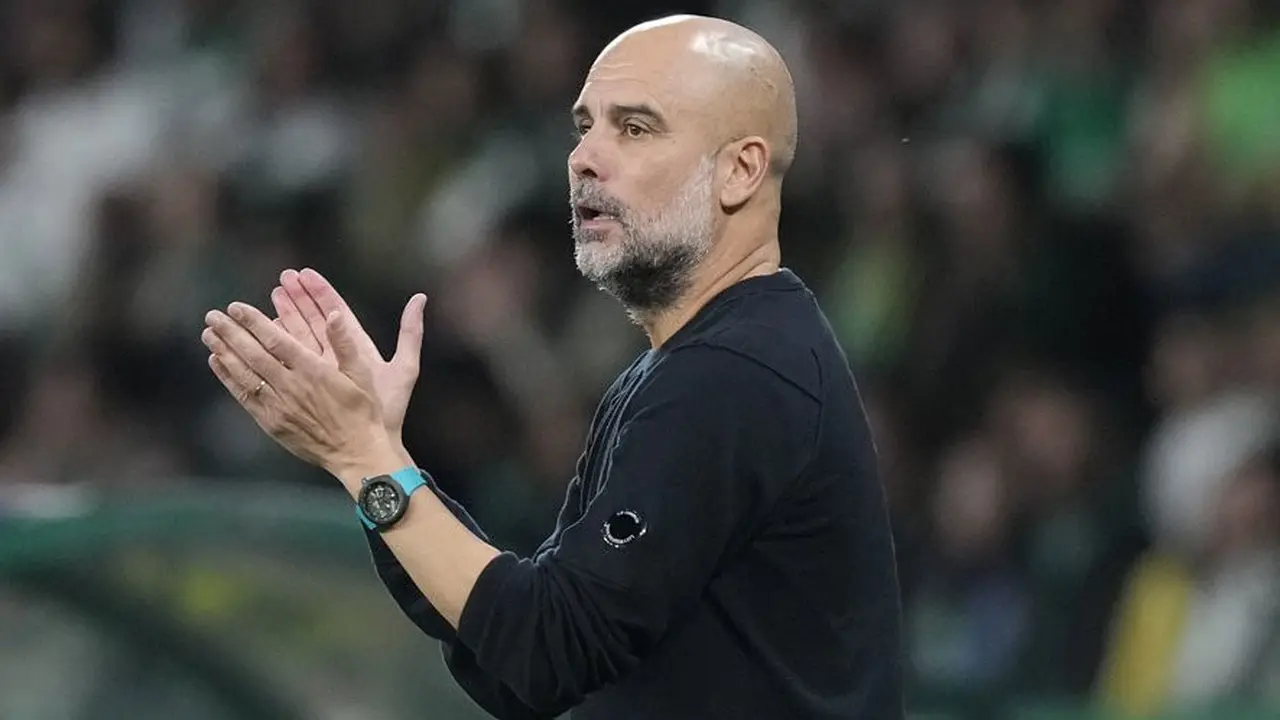 Josep Guardiola pada laga Sporting CP vs Man City di Liga Champions 2024/2025 (c) AP Photo/Armando Franca