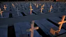 Kuburan tentara yang tewas dalam invasi Turki ke Siprus terlihat di pemakaman militer Tymvos Macedonitissas, Nicosia, Siprus, Senin (20/7/2020). Ribuan orang Yunani dan tentara Siprus tewas selama invasi Turki ke Pulau Siprus pada tahun 1974. (AP Photo/Petros Karadjias)