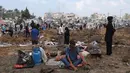 Ledakan akibat serangan Israel tersebut sempat memicu kepanikan warga. (Eyad BABA/AFP)