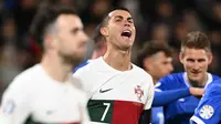Striker Portugal Cristiano Ronaldo pada pertandingan kualifikasi Euro 2024 melawan Liechtenstein pada hari Jumat (17/11/2023) dini hari WIB. (SEBASTIEN BOZON / AFP)