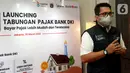 Wakil Kepala Bapenda DKI Jakarta , Elvarinsa memberi sambutan pada peluncuran Tabungan Pajak Bank DKI di Jakarta (30/3/2022). Bank DKI terus meningkatkan kemudahan warga Jakarta dalam pembayaran pajak daerah, melalui aplikasi JakOne Mobile, ATM, EDC untuk nasabah perorangan. (Liputan6.com/HO/BDKI)