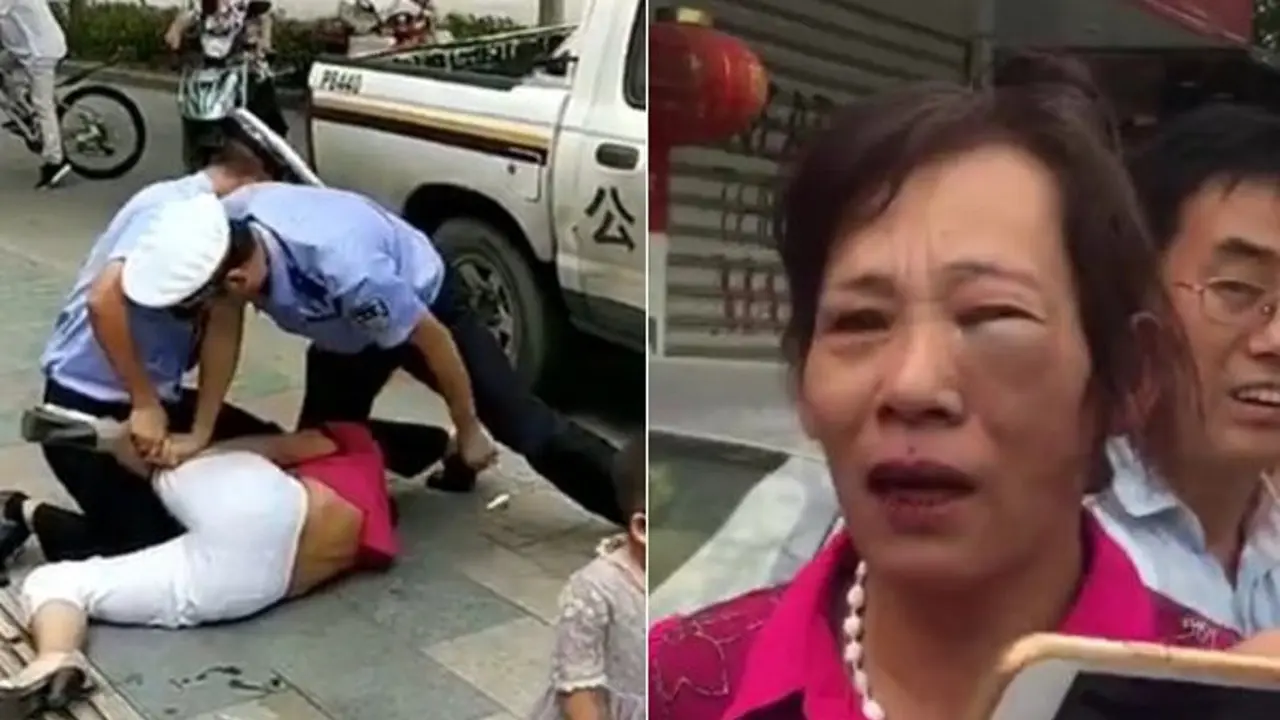 Wanita bermarga Zhang, yang dibanting oleh polisi. (Weibo)