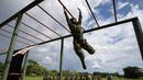 Perekrutan wanita itu merupakan bagian dari upaya untuk memperkuat peran perempuan dalam jajarannya. Melihat Tentara Wanita Kolombia Latihan Militer. (AFP/Raul Arboleda)