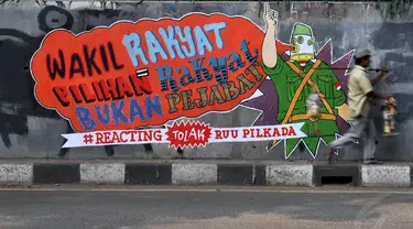 Sebuah mural terpampang di tembok fly over kawasan Pejompongan, Jakarta, (28/9/14). (Liputan6.com/Miftahul Hayat) 